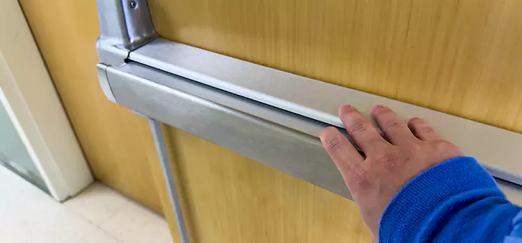 Installing a Push Bar on a Door Flowing Wells